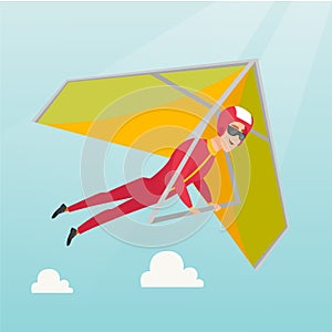 Young caucasian man flying on hang-glider.