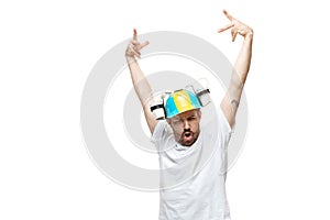 Young caucasian man with funny, unusual popular emotions and gestures isolated on white studio background