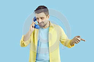 Man talk on landline telephone with customer support