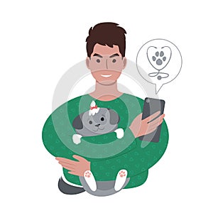 young caucasian man with a tiny dog searching for veterinarian online from smartphone.