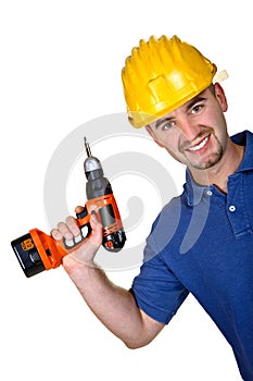 Young caucasian manual worker with drill