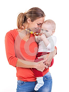 Young Caucasian woman and baby boy over white