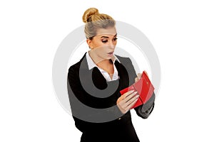 Young caucasian woman with empty wallet - broke