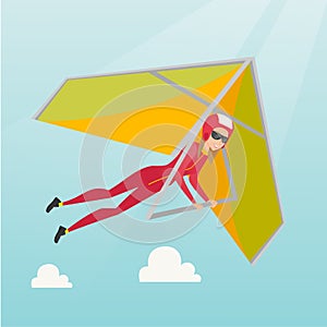 Young caucasian woman flying on hang-glider.