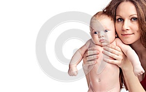 Young caucasian woman holding two-month old son