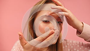 Young caucasian woman putting contact lenses over her green eyes. Eye health concept