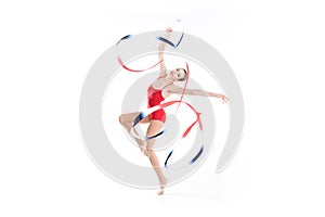 Young caucasian woman rhythmic gymnast exercising with rope