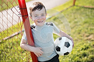 Young caucassian soccer player football