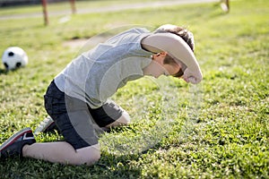 Young caucassian soccer player football