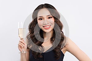 Young celebrating woman. Beautiful asian portrait isolated over