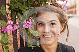 Young charming girl portrait outdoors. Happiness.