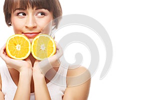 Young cheerful woman with oranges