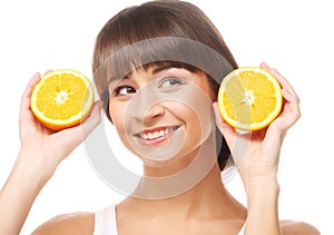 Young cheerful woman with oranges