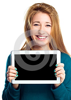 Young cheerful woman is showing blank tablet