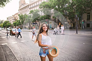 Young cheerful woman in the street