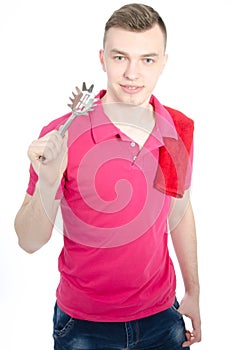 Young chef. Posing in studio.