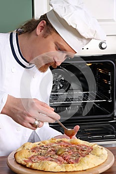 Young chef prepared italian pizza