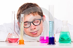 Young chemist sleeps in the lab