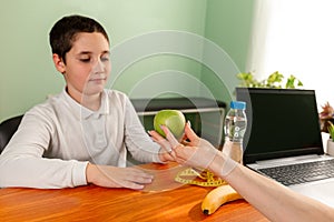 Young child eating stealthily high calorie foods. Health problem