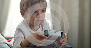 Young Child Engaged in Video Gaming