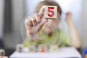 Young Child Learning Mathematics with Number Blocks