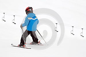 Young child on piste in Swizz Alps