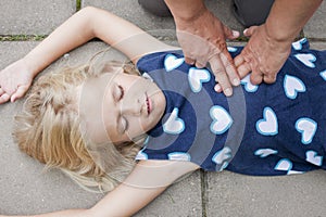 Young child receiving first aid