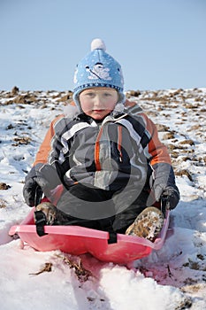 Young child on sledge