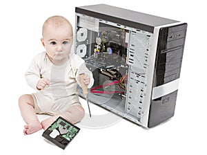 Young child working on open computer