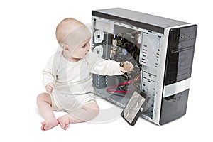 Young child working on open computer