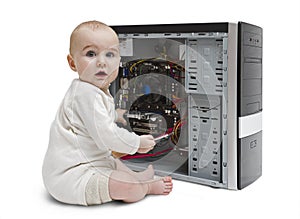 Young child working on open computer