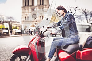 Young Chinese Female On Scooter In Paris