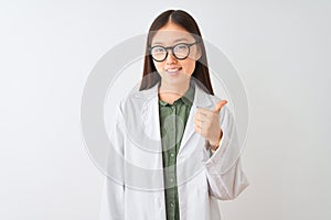 Young chinese scientist woman wearing coat and glasses over isolated white background doing happy thumbs up gesture with hand