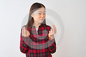 Young chinese woman wearing casual jacket standing over isolated white background doing money gesture with hands, asking for