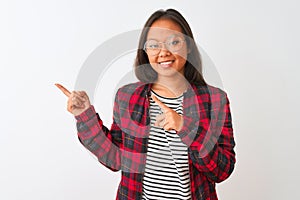 Young chinese woman wearing t-shirt jacket and glasses over isolated white background smiling and looking at the camera pointing