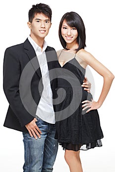 Young, Chinese working couple dressed for party