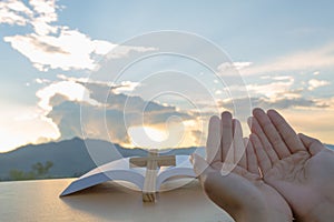 Young christian woman hands open palm up worship and praying to