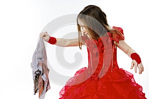 Young cinderella dressed in red with dirty cloth