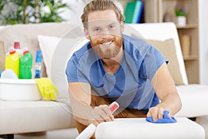 young cleaning company worker cleaning photo