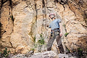 Young Climber Getting Ready To Climb