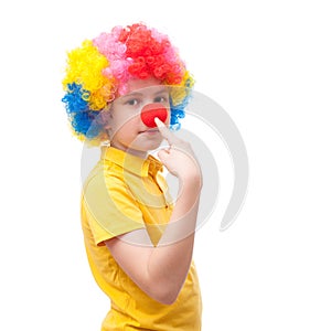 Young clown points to his nose