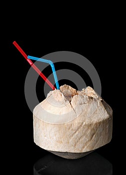 Young coconut isolated on a black background