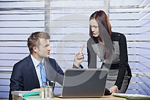 Young colleagues working together in the office