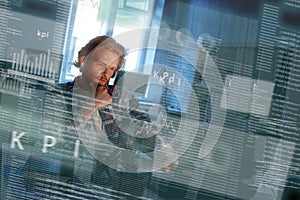 Young concentrated computer developer writing new code