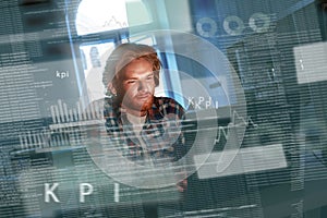 Young concentrated computer developer writing new code