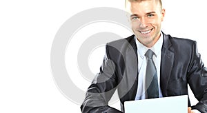 Young confident business man with laptop