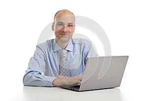 Young confident business man with laptop