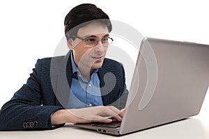 Young confident business man with laptop