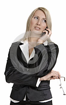 Young confident business woman on the phone.