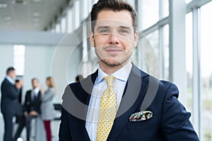 Young and confident businessman. Handsome young man in formalwear smiling at camera photo